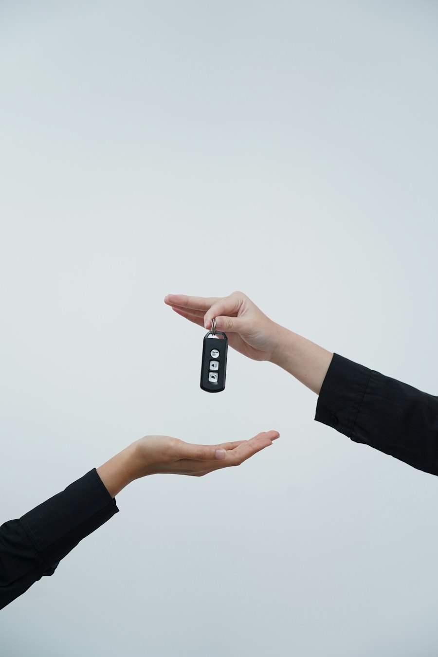 Car key being handed over